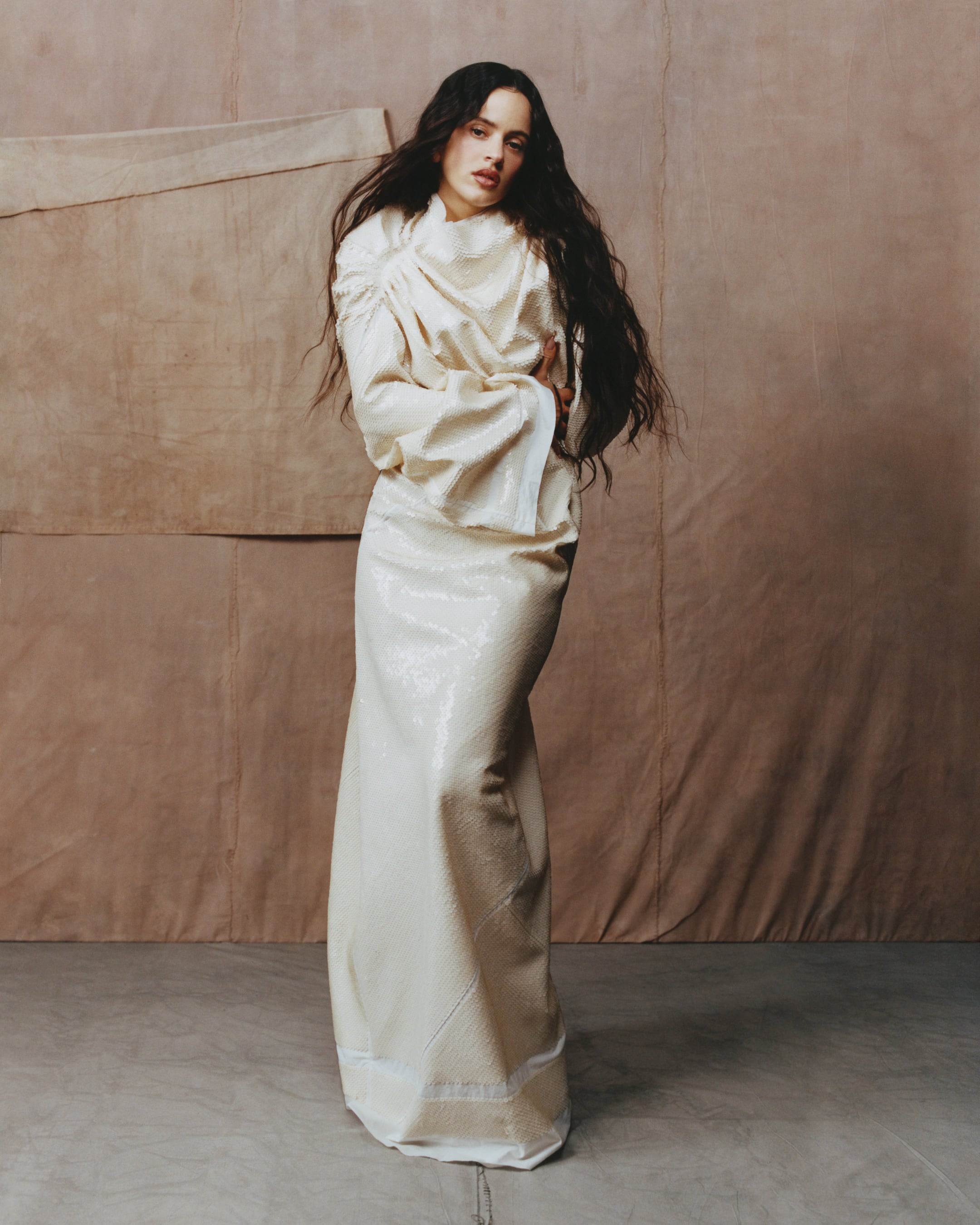 Rosalía wearing a long sequined dress by Rick Owens.