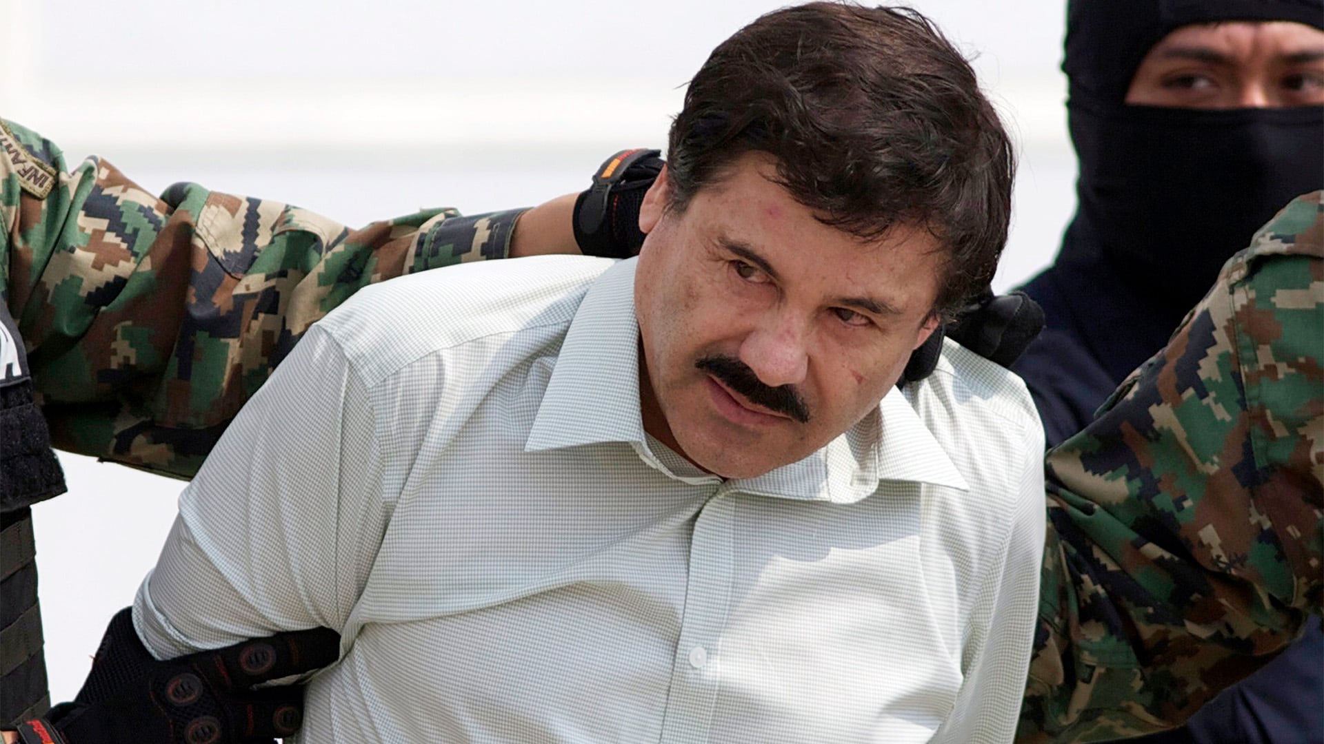 Joaquín Guzmán Loera durante su segunda detención, efectuada en 2014Crédito: AP